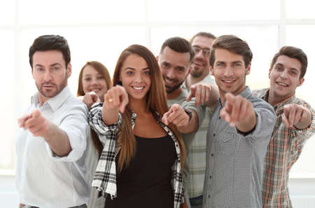 group of young people pointing at you