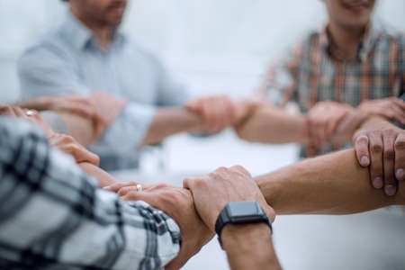 background image.business team standing in a circleの写真素材