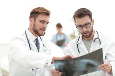 two doctors looking at x-ray.の写真素材