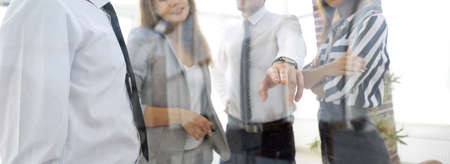 from behind the glass.business team in the officce