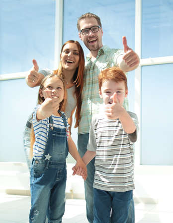 happy family showing thumbs upの写真素材