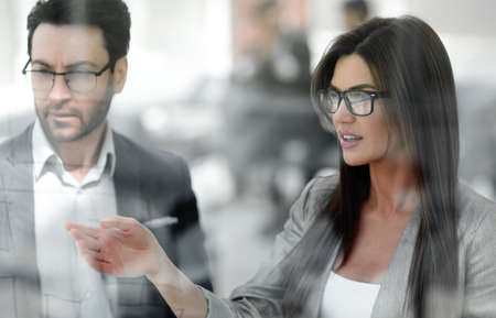 close up.business woman talking to business partnerの写真素材