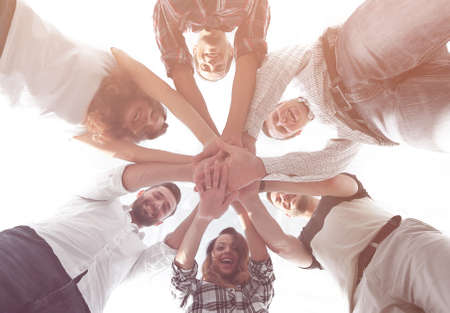 business team with hands clasped together
