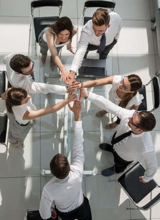 top view.employees of the company showing their unityの写真素材