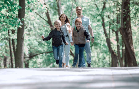 parents with children in the city Park.の写真素材