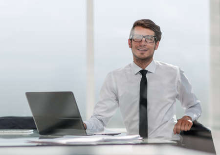 businessman sitting in a spacious office