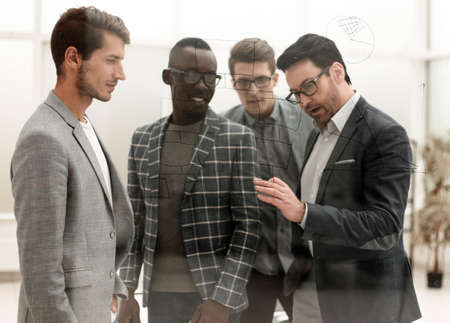 business team discussing ideas for new presentation.の写真素材