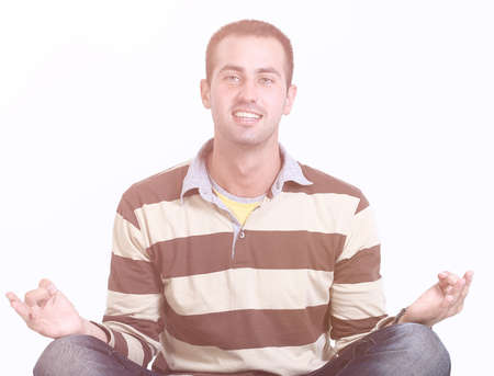 modern young man sitting on the floorの写真素材