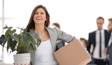 smiling business woman on the background of the new office.の写真素材