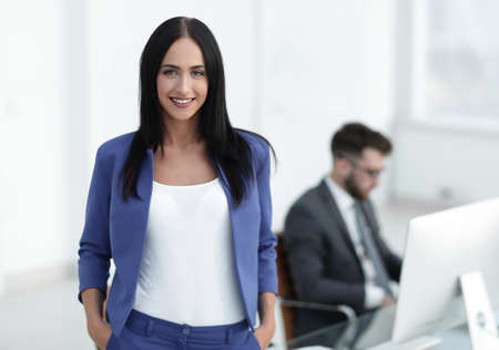 Successful young business woman with charming confident smile