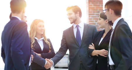 business handshake of businessmen in the officeの写真素材
