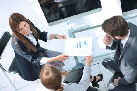 top view.business team discussing new financial project