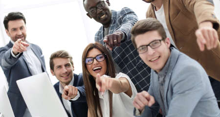 professional business team pointing at youの写真素材