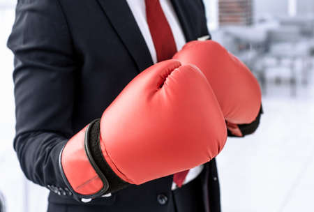 close up.businessman in Boxing gloves
