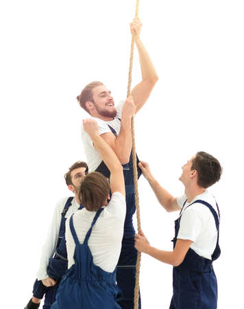 group workers help the companion to climb up