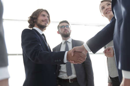 business people handshaking after good deal.