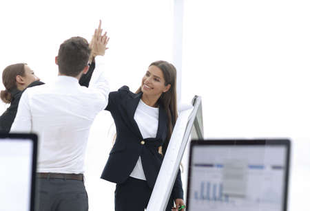 closeup.business team, giving each other a high five