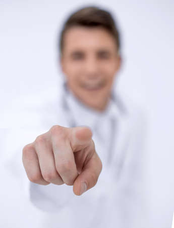 background image.a successful doctor-diagnostician pointing to youの写真素材