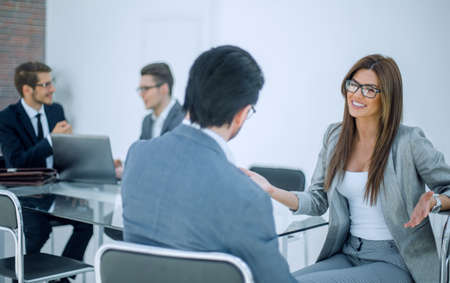 business woman talking to business partnerの写真素材