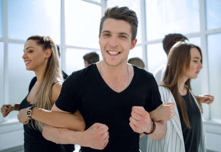 young business team standing in a circle