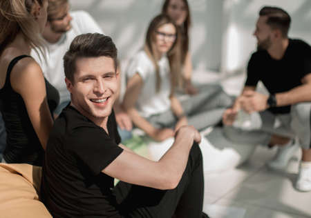 young employee on the background of creative business teamの写真素材