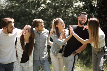 friends on a walk, give each other a high fiveの写真素材