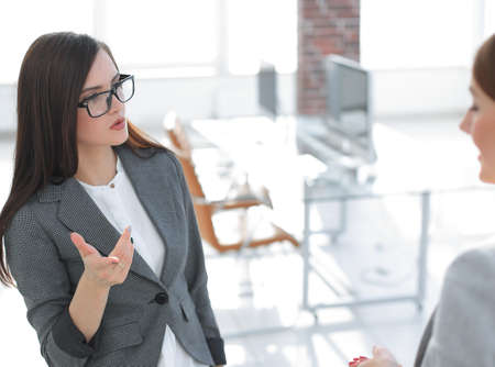 two employees on the background of a modern officeの写真素材