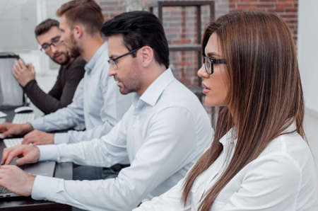 professional business team working on a PC in a modern officeの写真素材