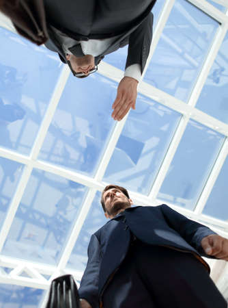 Close-up of business people handshaking