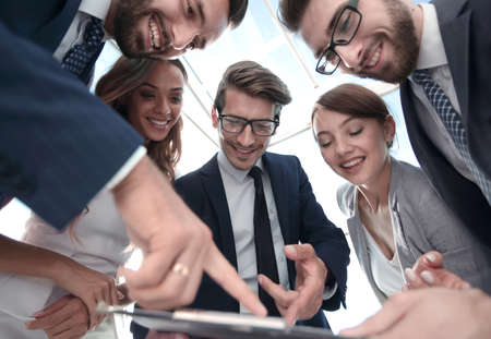 smiling business team discussing the results obtainedの写真素材