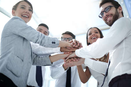close up. the business team put their hands togetherの写真素材