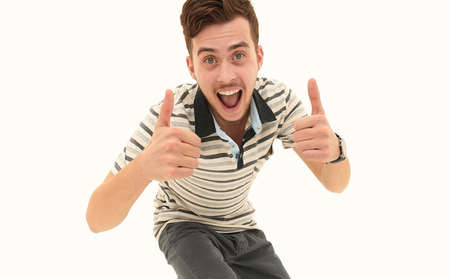 closeup. happy guy celebrating his success.の写真素材