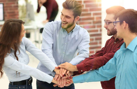 Group of people hands together partnership teamwork.の写真素材