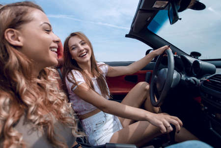 girlfriends talk, traveling in the carの写真素材