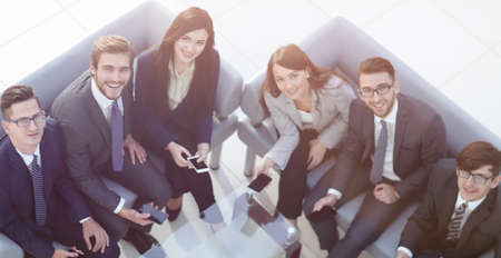 Top view of beautiful young business  people in using smartphone