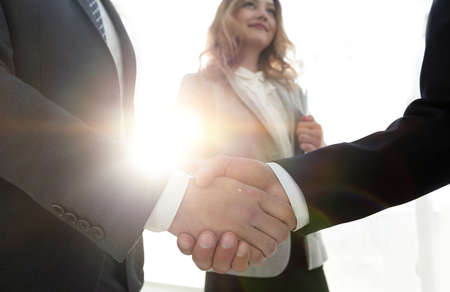 Close up business man handshake together on meeting room