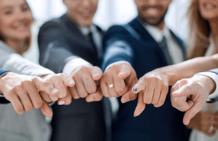 close up. business team pointing at you.の写真素材
