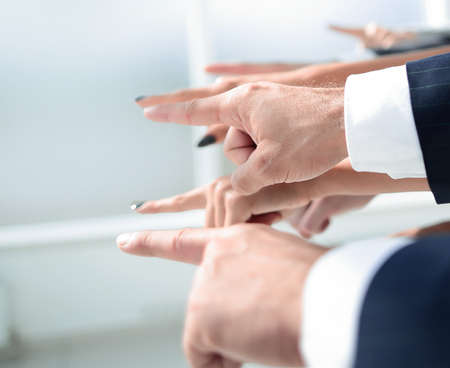 close up.business team pointing to the side