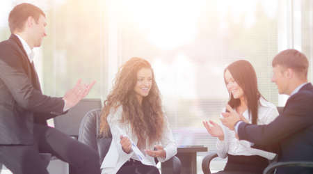 business team applauding its results