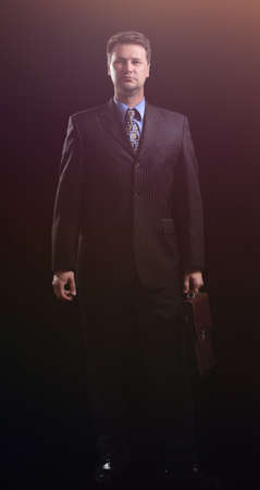 in full growth.confident businessman with briefcaseの写真素材