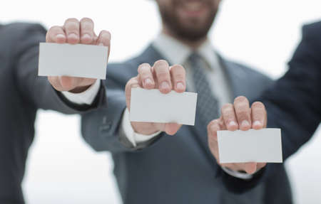 business people showing their business cardsの写真素材