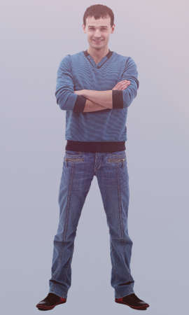 Young happy casual man portrait, isolated on gray background