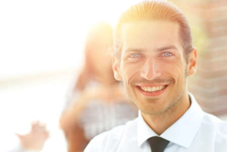 successful young business men on blurred backgroundの写真素材