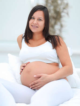 portrait of a happy pregnant woman.の写真素材