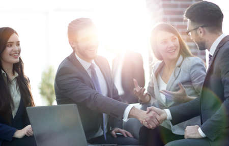 Successful partnership in business displayed by shaking hands inの写真素材