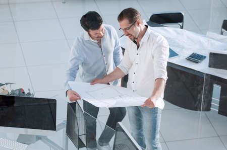 top view.two architects standing in a creative officeの写真素材