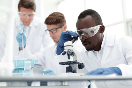 close up.a multinational group of scientists is conducting researchの写真素材