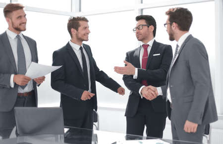 business partners handshake after signing the contractの写真素材