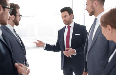boss discussing with business team a new business planの写真素材