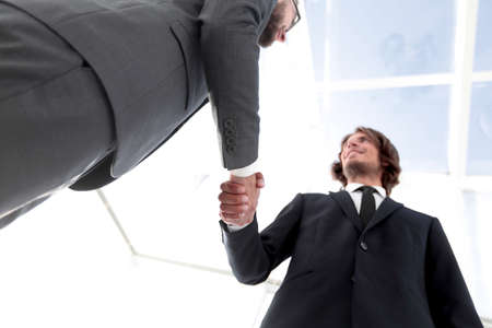 Photo of handshake of two happy businessmenの写真素材